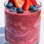 Healthy mixed berry smoothie for weight loss made with strawberries, blueberries, and chia seeds in a glass