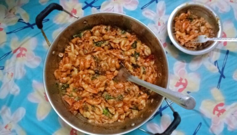 Homemade garlic butter pasta with herbs and cheese