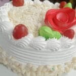 soft fluffy homemade vanilla cake with buttercream frosting