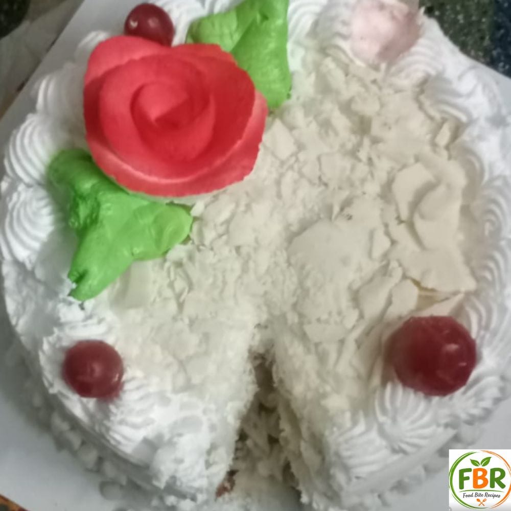 homemade vanilla cake cut open showing soft fluffy layers inside