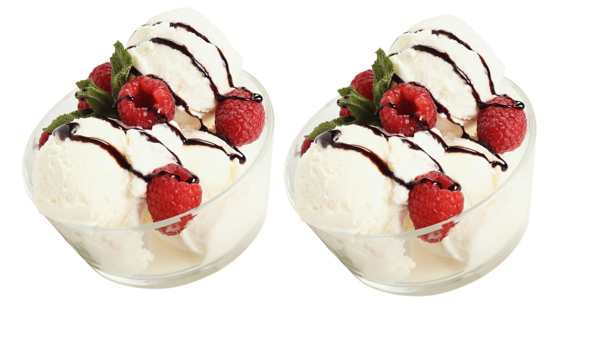 Homemade vanilla ice cream without a machine served with fresh raspberries