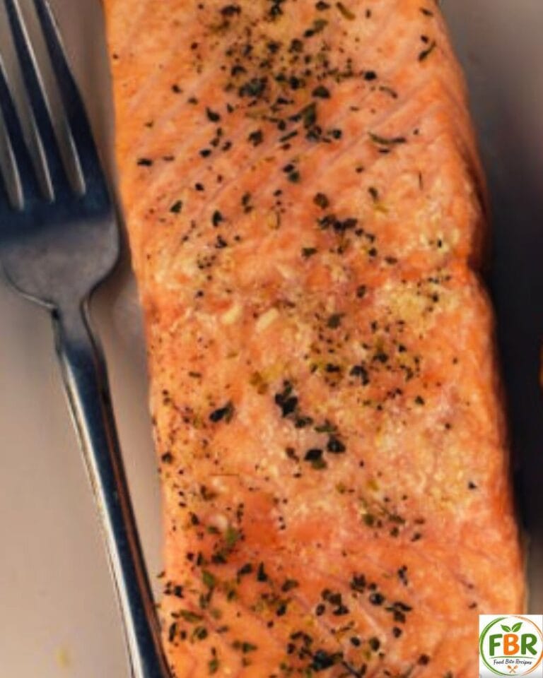crispy air fryer salmon bites recipe served with lemon and herbs