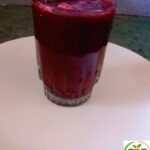 Fresh amla beetroot carrot juice in a glass – healthy homemade juice