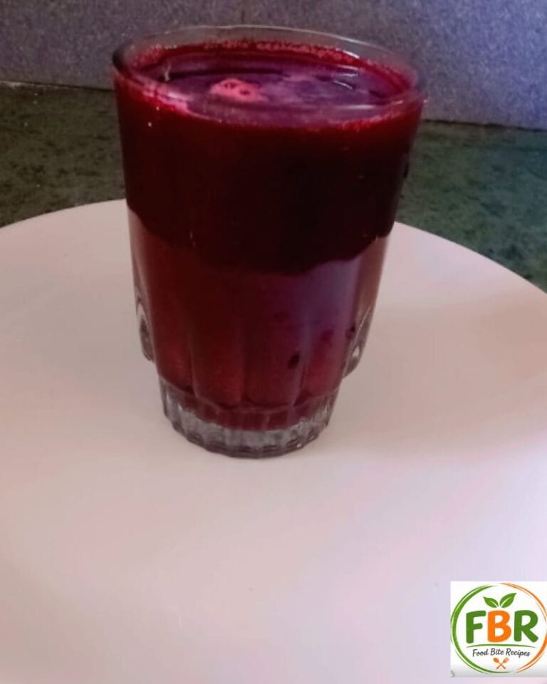 Fresh amla beetroot carrot juice in a glass – healthy homemade juice